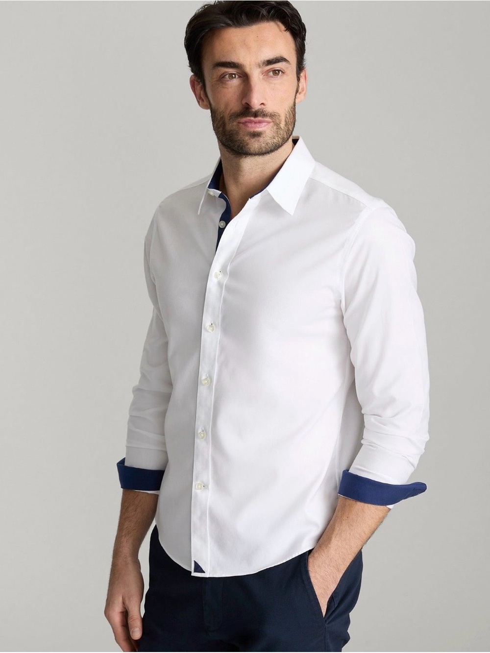 UNTUCKit White Button Down Shirt with Navy Button Placket and Cuff Trim